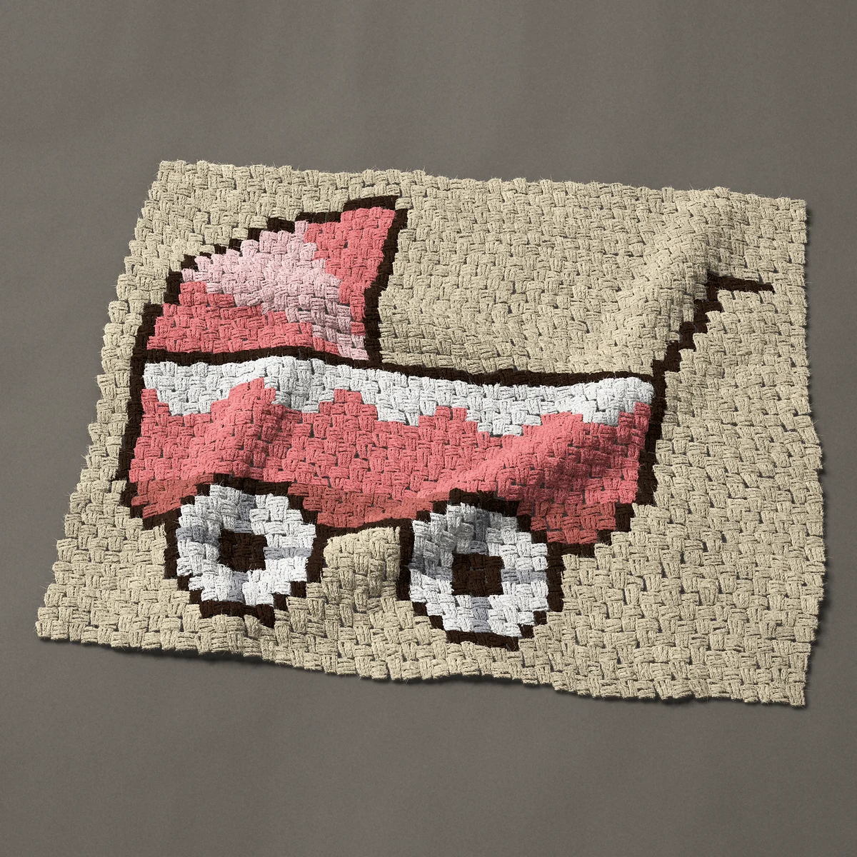 A baby blanket worked corner to corner, 36¾ by 31½ inches: Pink baby carriage: a pram or baby buggy with a hood, 49 by 42 blocks