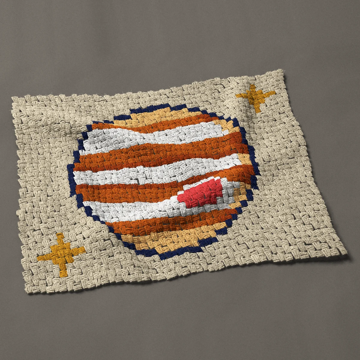 A panel worked corner to corner, 35¼ by 27¾ inches: Planet Jupiter with its red spot and two gold stars, 47 by 37 blocks