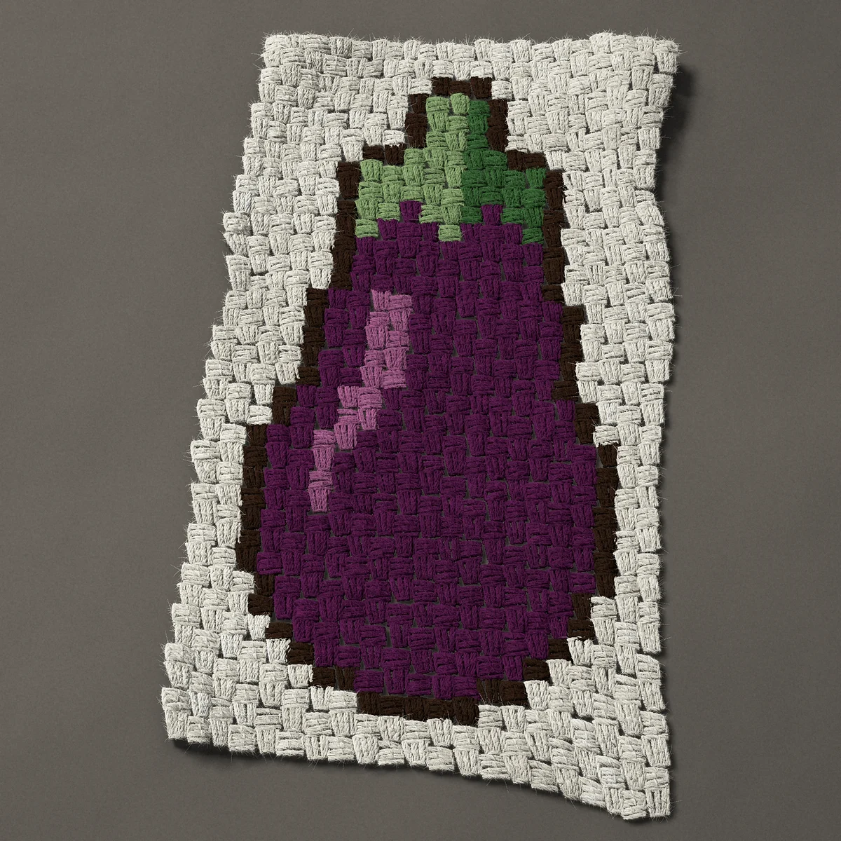A panel worked corner to corner, 15¾ by 27 inches: Eggplant: purple aubergine with a green cap, 21 by 36 blocks