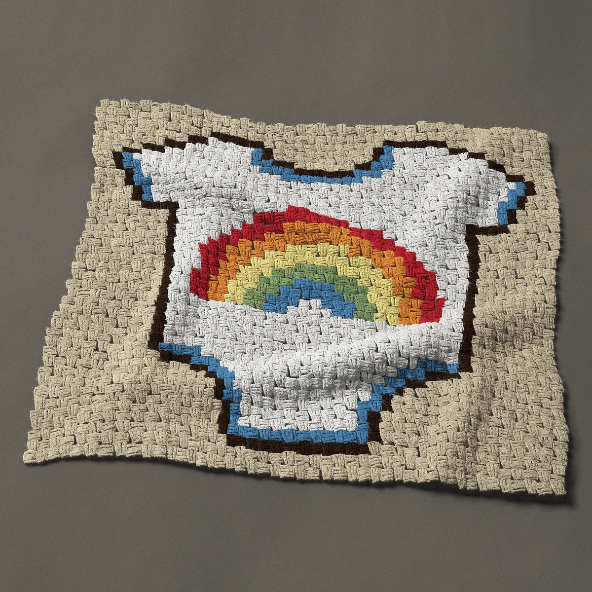 A panel worked corner to corner, 34½ by 31½ inches: Rainbow baby: white bodysuit with a rainbow, 46 by 42 blocks