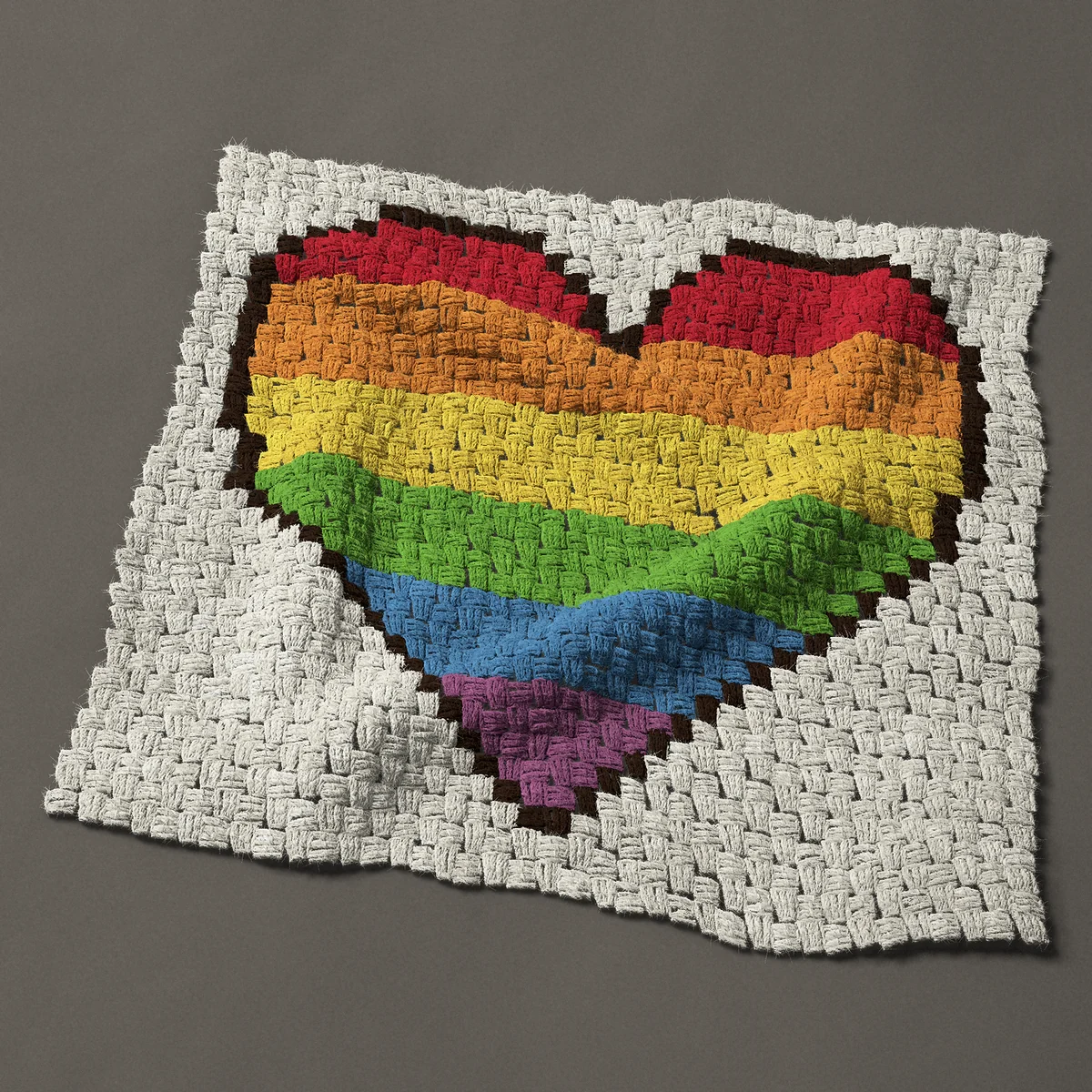 A panel worked corner to corner, 28½ by 27 inches: Rainbow heart in six stripes with a dark outline, 38 by 36 blocks
