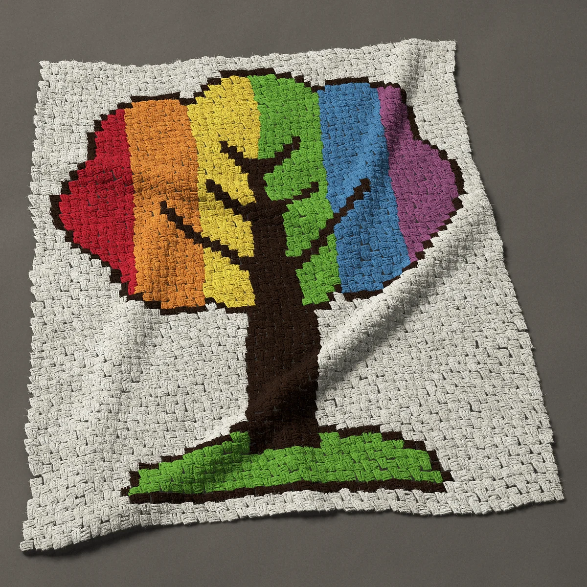 A baby blanket worked corner to corner, 40½ by 49½ inches: Rainbow tree with striped leaves on a green mound, 54 by 66 blocks