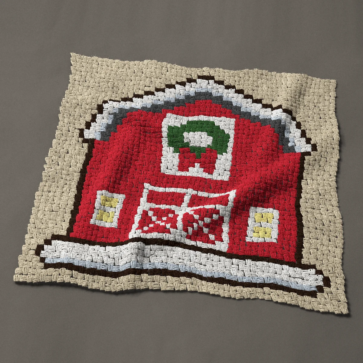 A baby blanket worked corner to corner, 39½ by 38 inches: Red barn in the snow with a Christmas wreath, 53 by 51 blocks