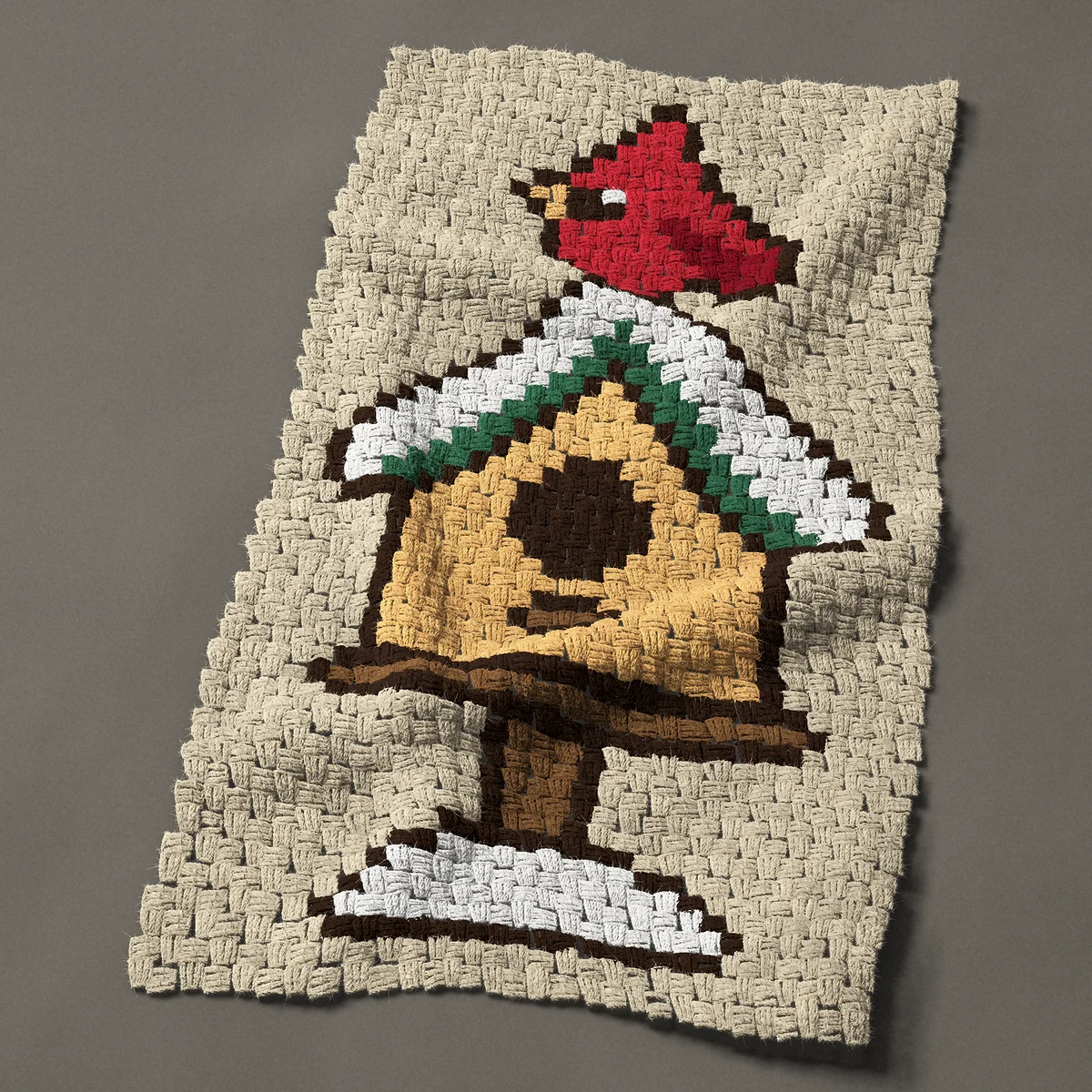 A panel worked corner to corner, 23¼ by 41 inches: Red cardinal on a snow covered bird house, 31 by 55 blocks