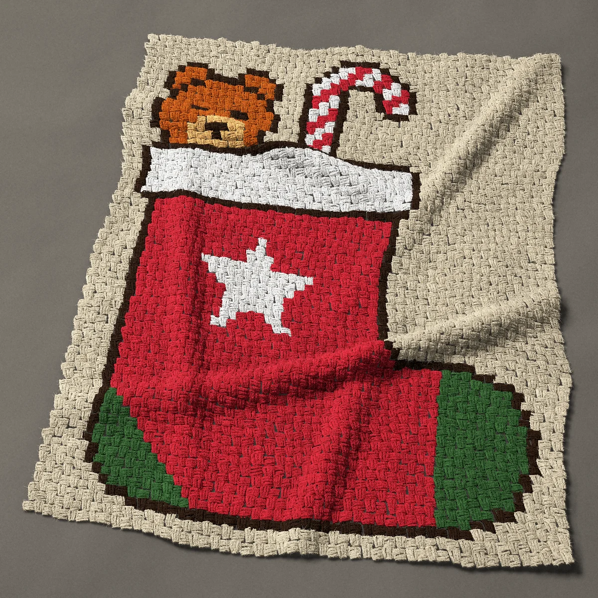 A baby blanket worked corner to corner, 39 by 50 inches: Red Christmas stocking with teddy bear and candy cane, 52 by 67 blocks