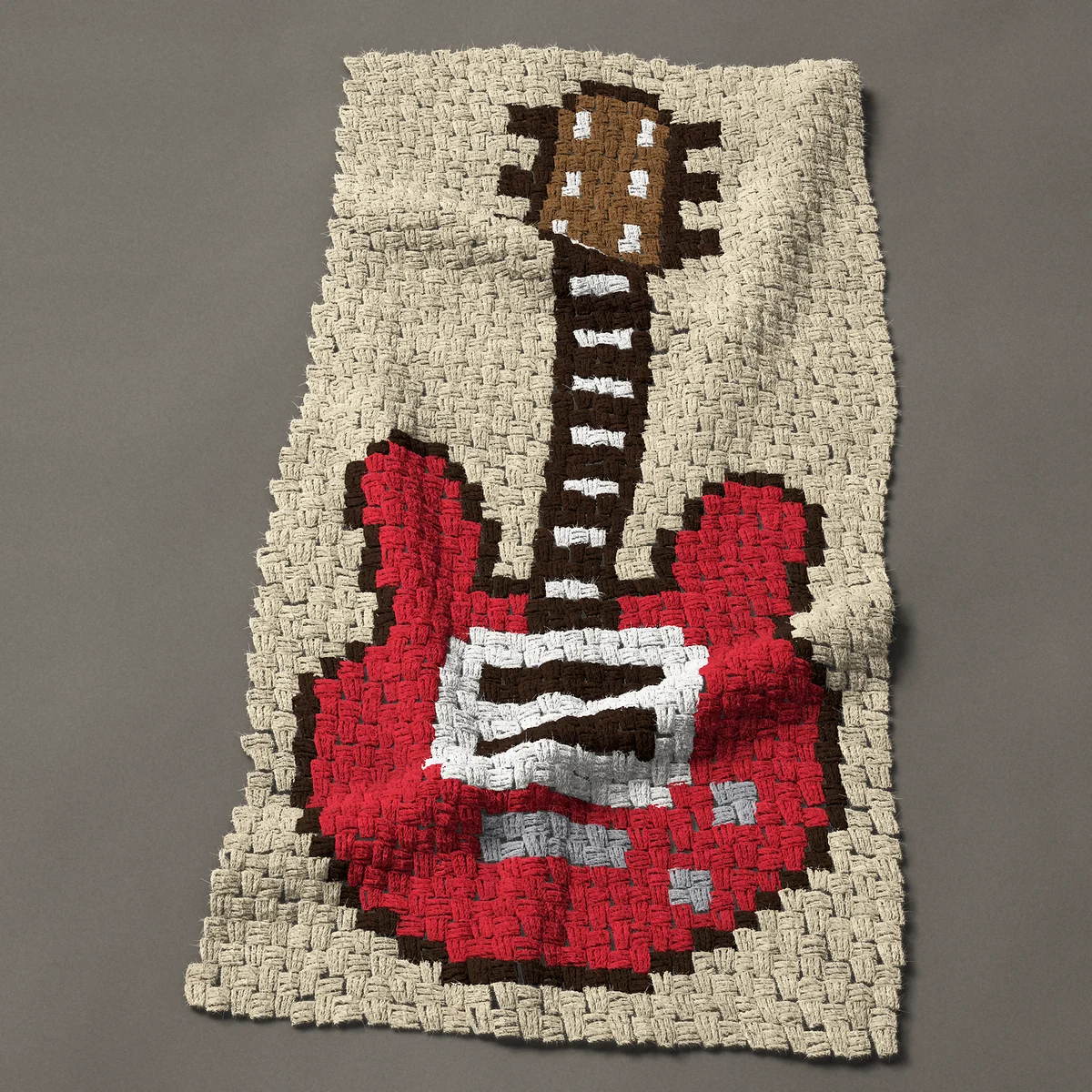 A panel worked corner to corner, 23¼ by 45 inches: Red electric guitar with a white pickguard, 31 by 60 blocks
