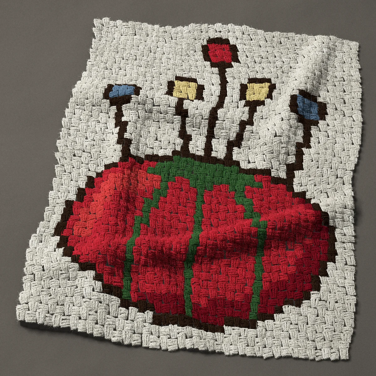 A baby blanket worked corner to corner, 29¼ by 37½ inches: Red tomato pincushion with five sewing pins, 39 by 50 blocks