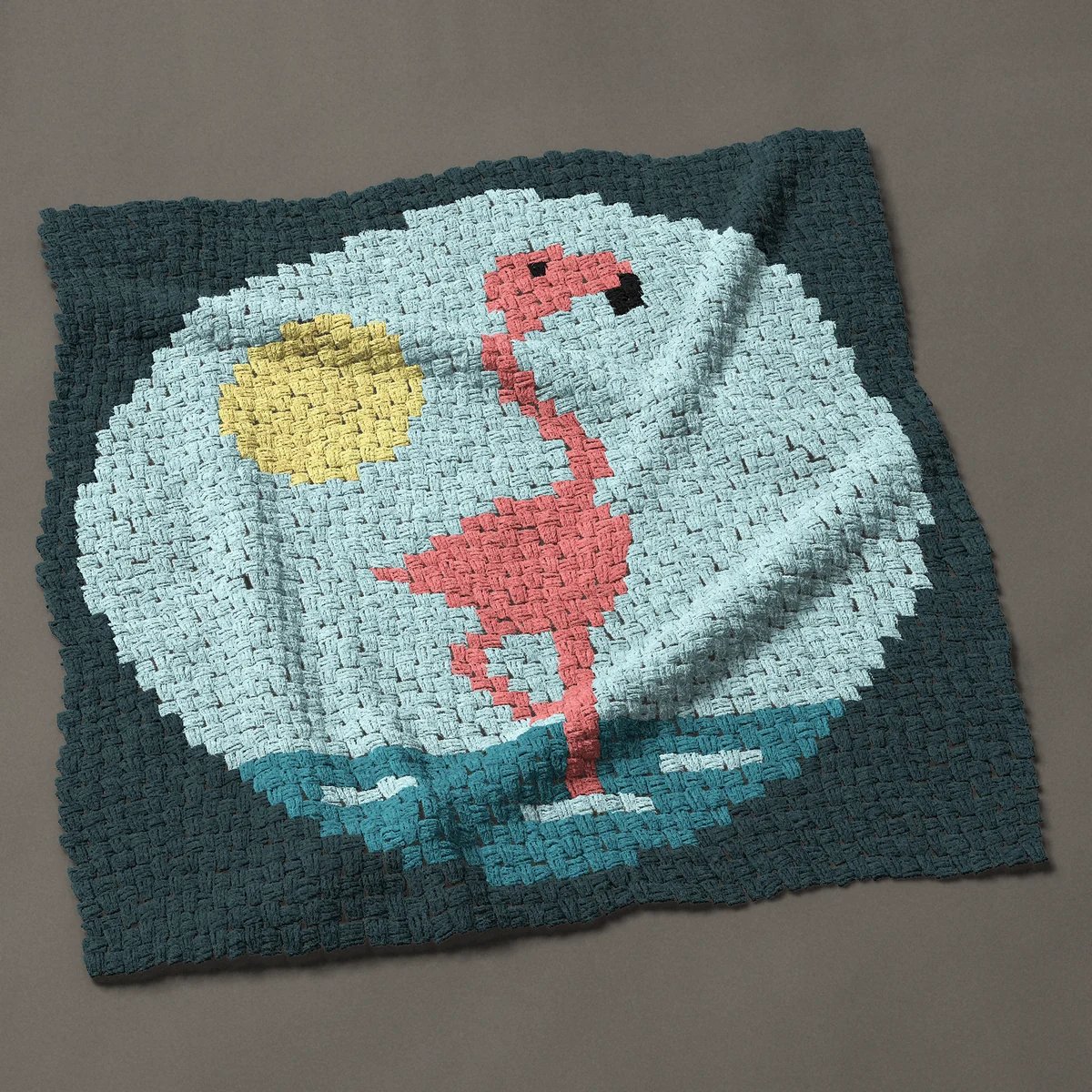 A baby blanket worked corner to corner, 39½ by 39½ inches: Pink flamingo on one leg in a round scene with the sun, 53 by 53 blocks