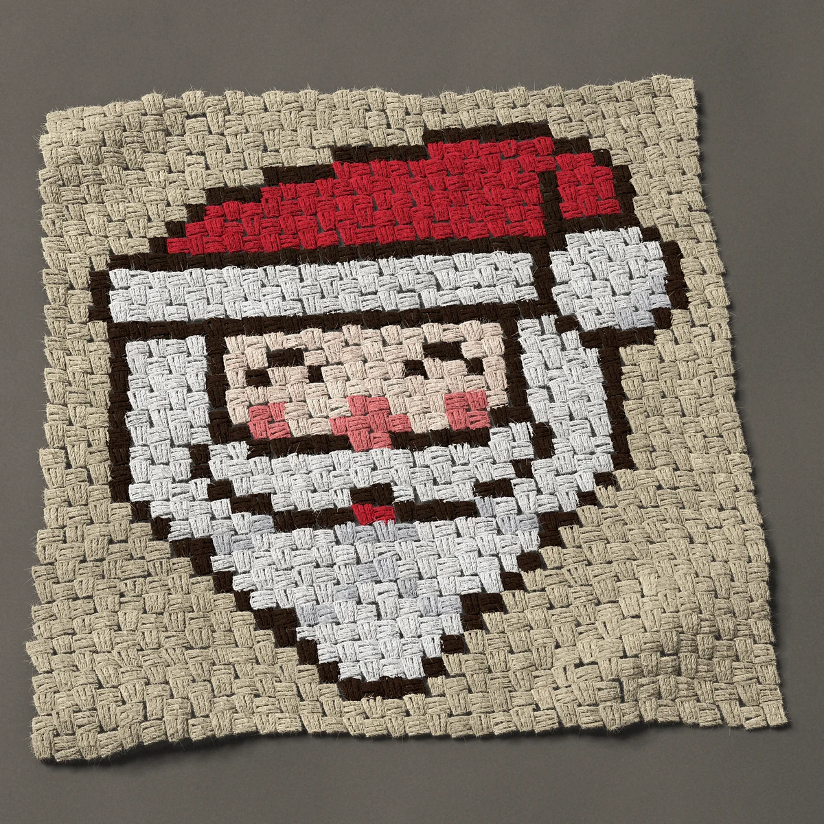 A panel worked corner to corner, 26¼ by 27 inches: Santa face with a floppy red hat and white beard, 35 by 36 blocks