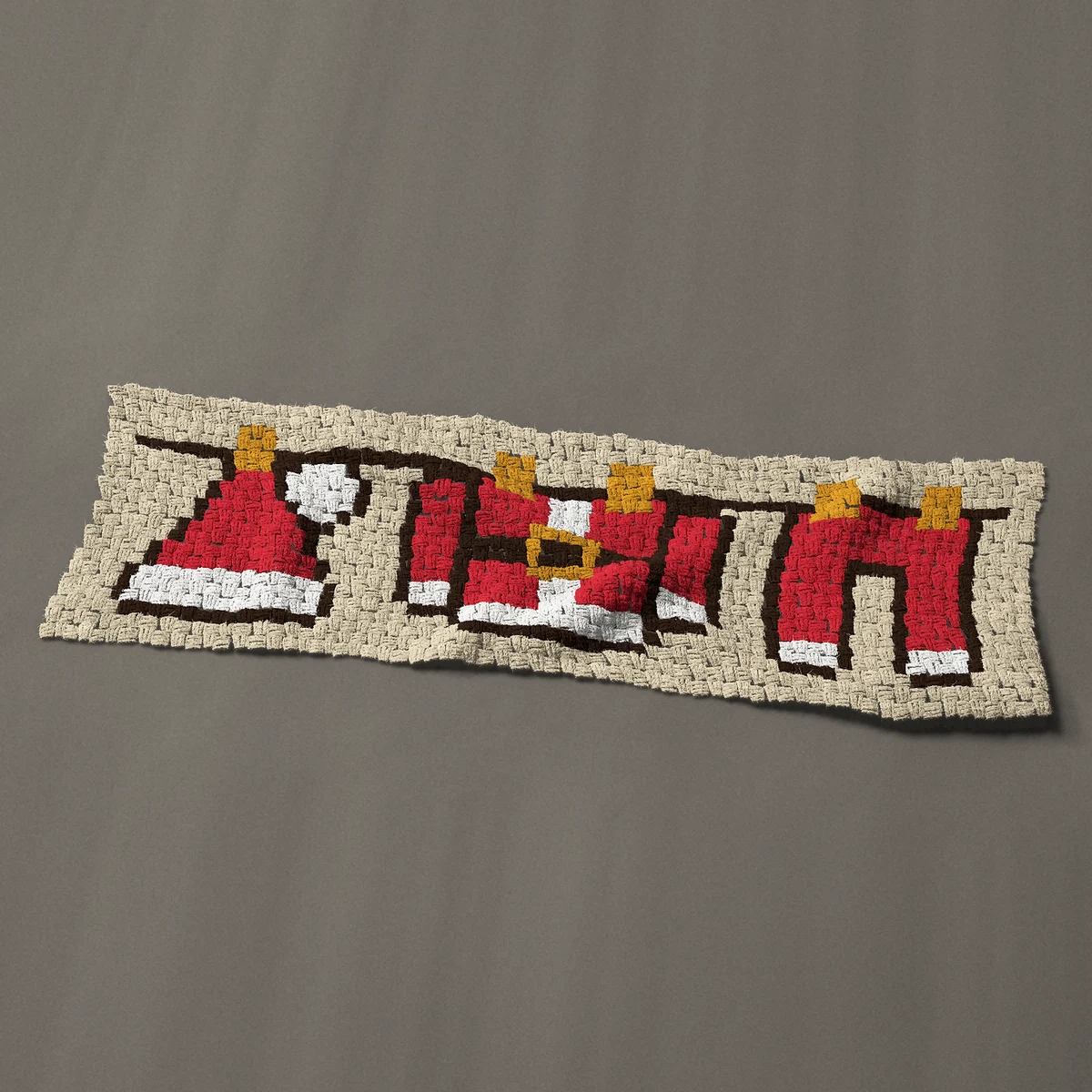 A panel worked corner to corner, 51 by 15¾ inches: Santa suit hanging on the washing line, 68 by 21 blocks