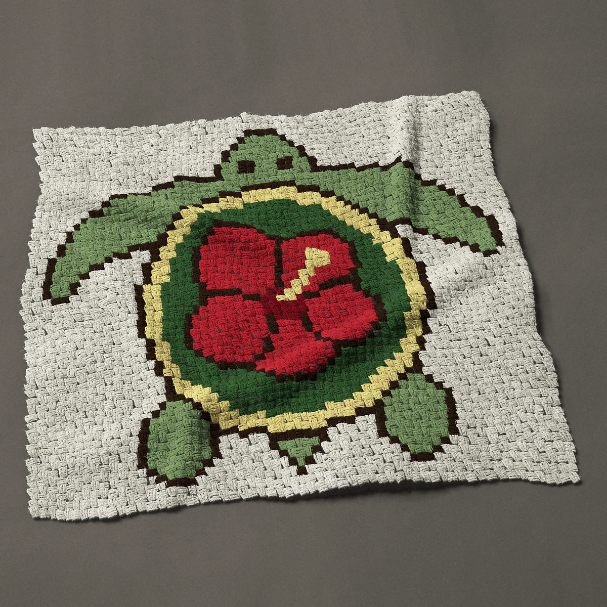 A baby blanket worked corner to corner, 44 by 42 inches: Sea turtle with a red hibiscus flower on its shell, 59 by 56 blocks