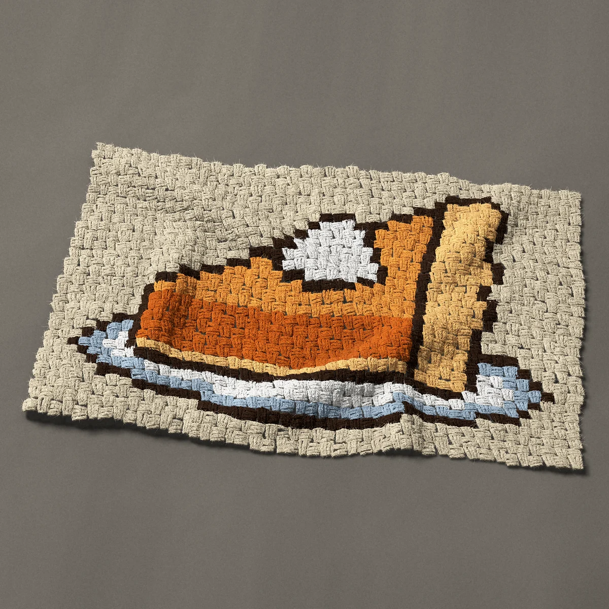 A panel worked corner to corner, 34½ by 22½ inches: Slice of pumpkin pie with whipped cream on a plate, 46 by 30 blocks