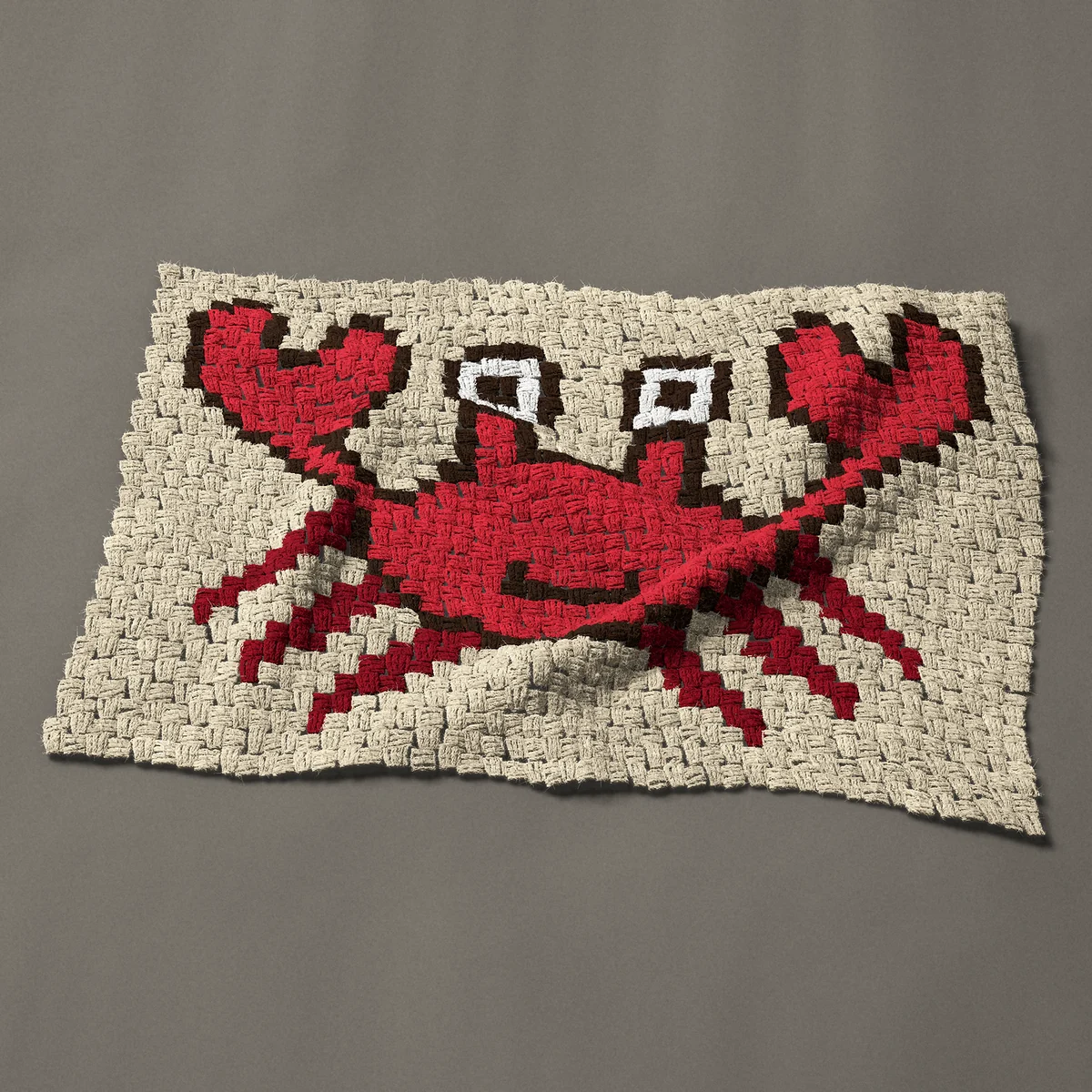A panel worked corner to corner, 35¼ by 24 inches: Cartoon red crab with raised claws, 47 by 32 blocks