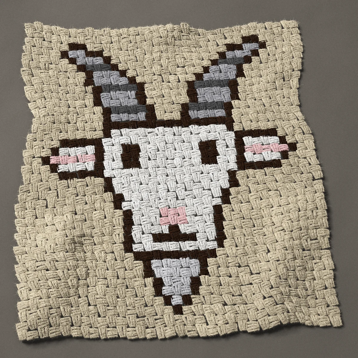 A panel worked corner to corner, 24¾ by 28½ inches: White goat face with gray horns and a beard, 33 by 38 blocks