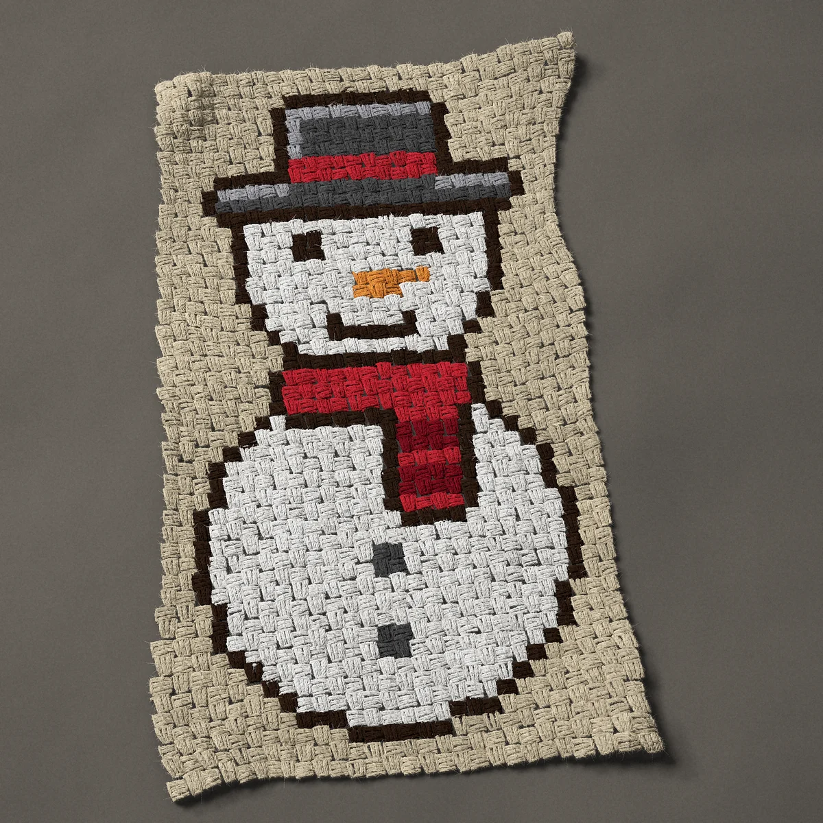 A panel worked corner to corner, 21 by 36¾ inches: Snowman with a top hat and red scarf, 28 by 49 blocks