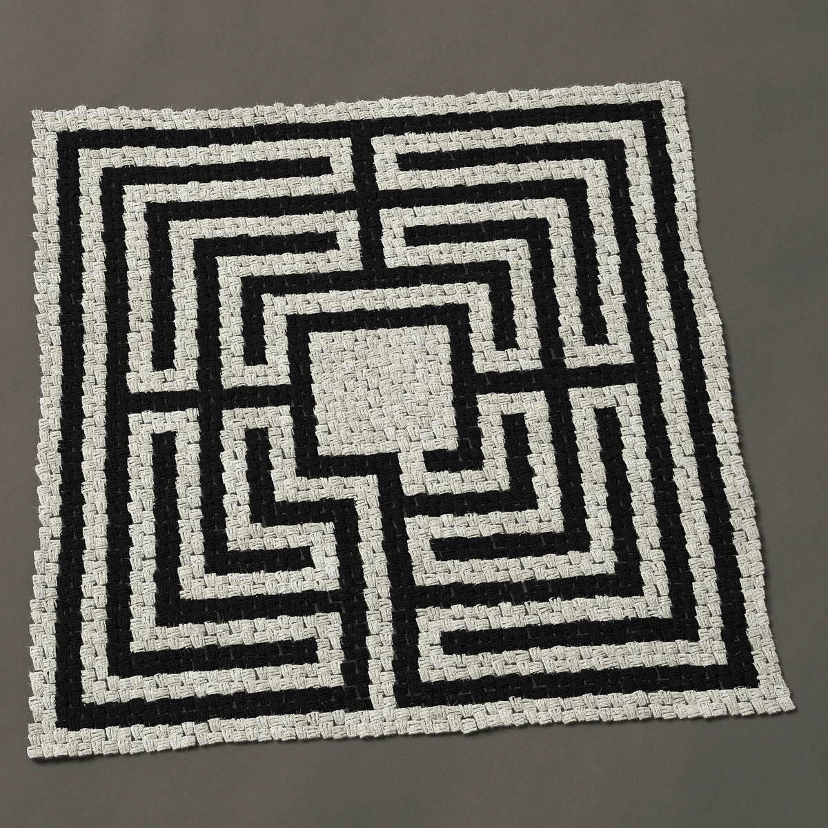 A panel worked corner to corner, 45 by 45 inches: Square labyrinth in one color, Roman mosaic style, 60 by 60 blocks