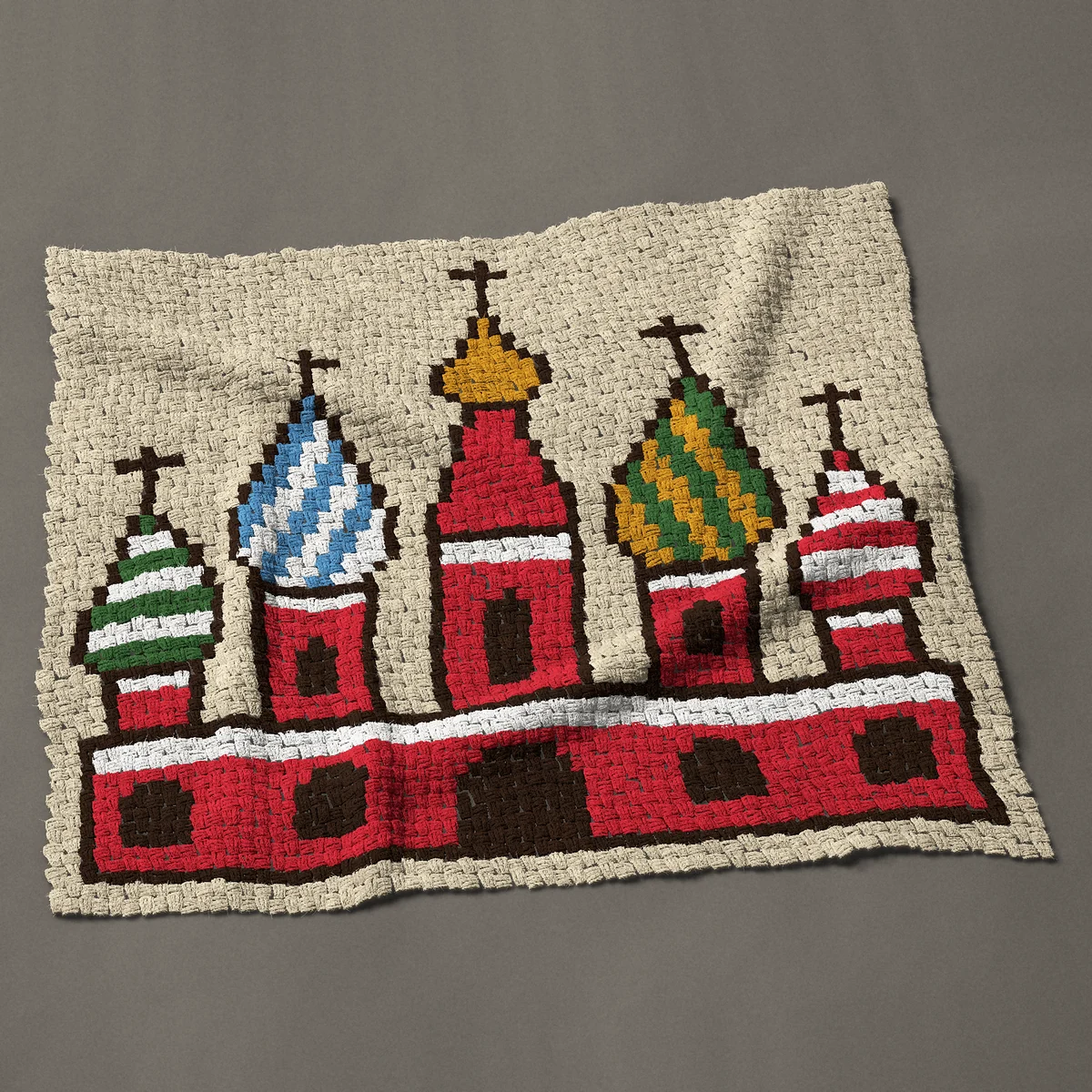 A panel worked corner to corner, 50 by 44 inches: St Basil's style cathedral with striped onion domes, 67 by 59 blocks