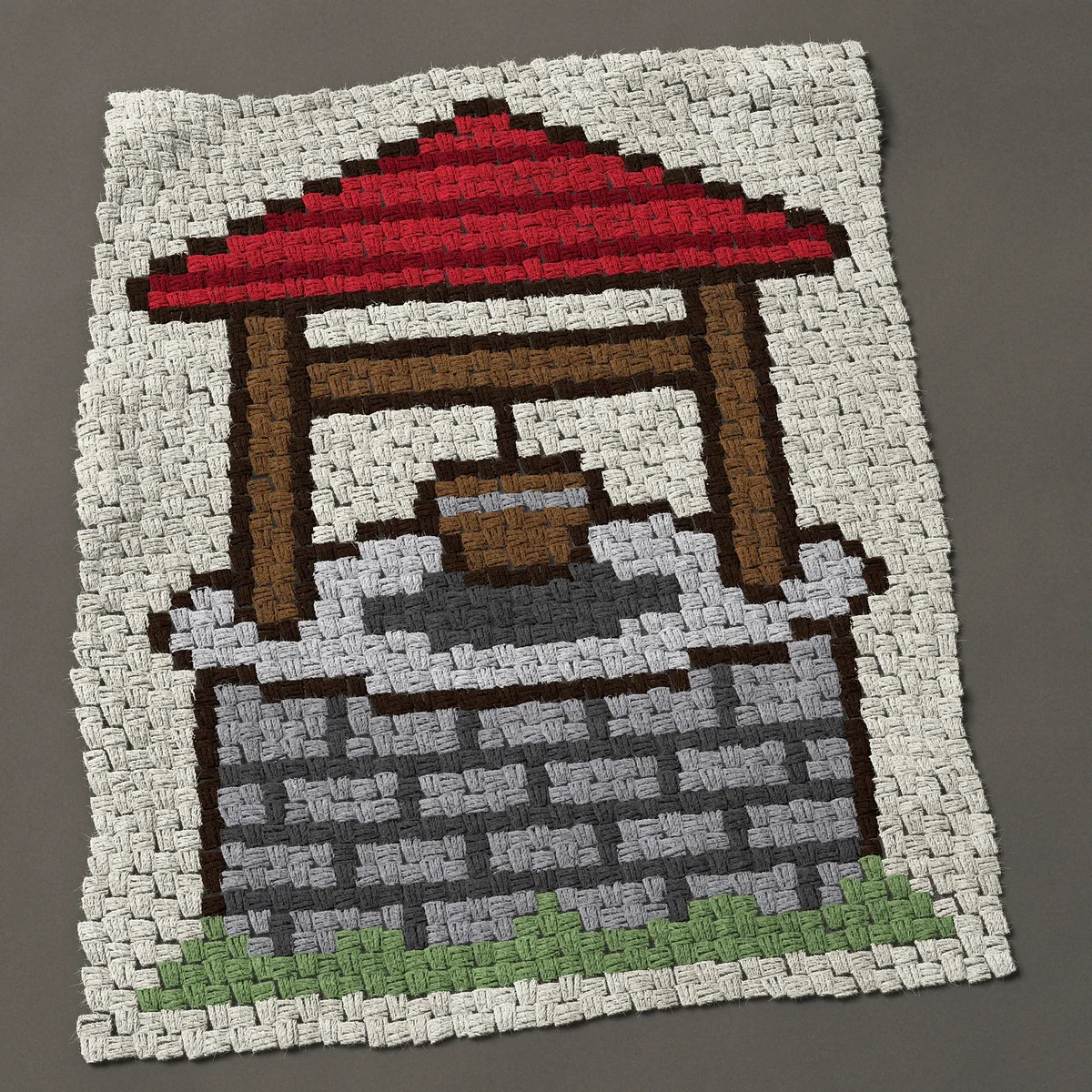 A baby blanket worked corner to corner, 30¾ by 38 inches: Wishing well with a red roof and a bucket for good luck, 41 by 51 blocks