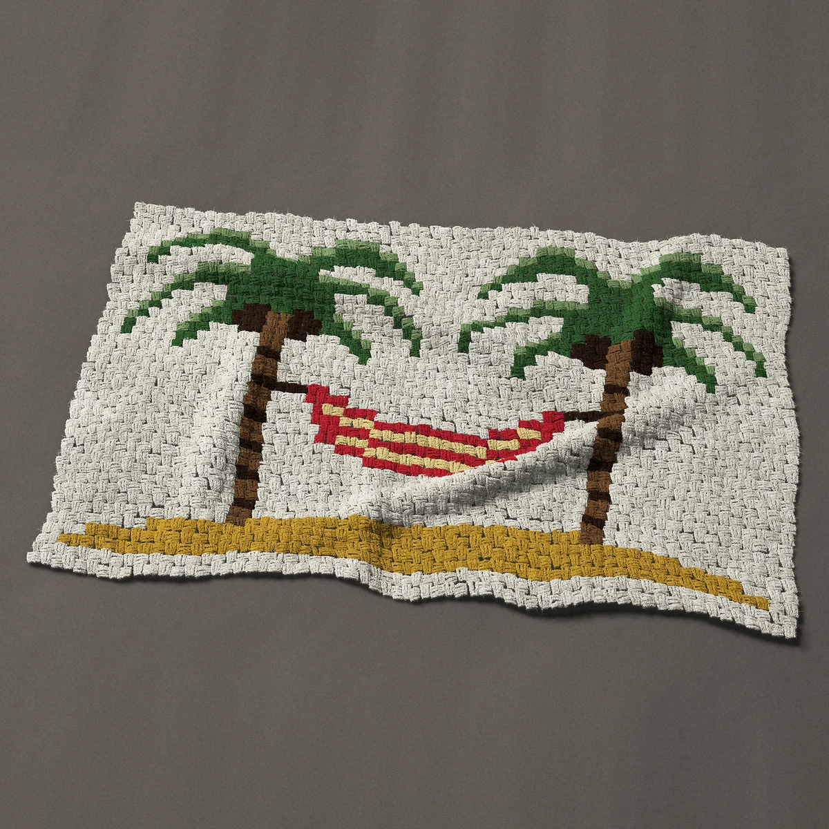 A baby blanket worked corner to corner, 48 by 30¾ inches: Two palm trees with a striped hammock on the sand, 64 by 41 blocks