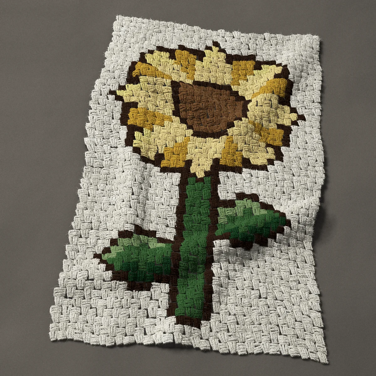 A panel worked corner to corner, 23¼ by 38 inches: Sunflower on a tall stem with two leaves, 31 by 51 blocks
