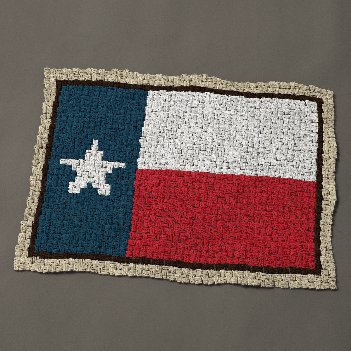 A baby blanket worked corner to corner, 38 by 27 inches: Texas state flag, the Lone Star flag, 51 by 36 blocks