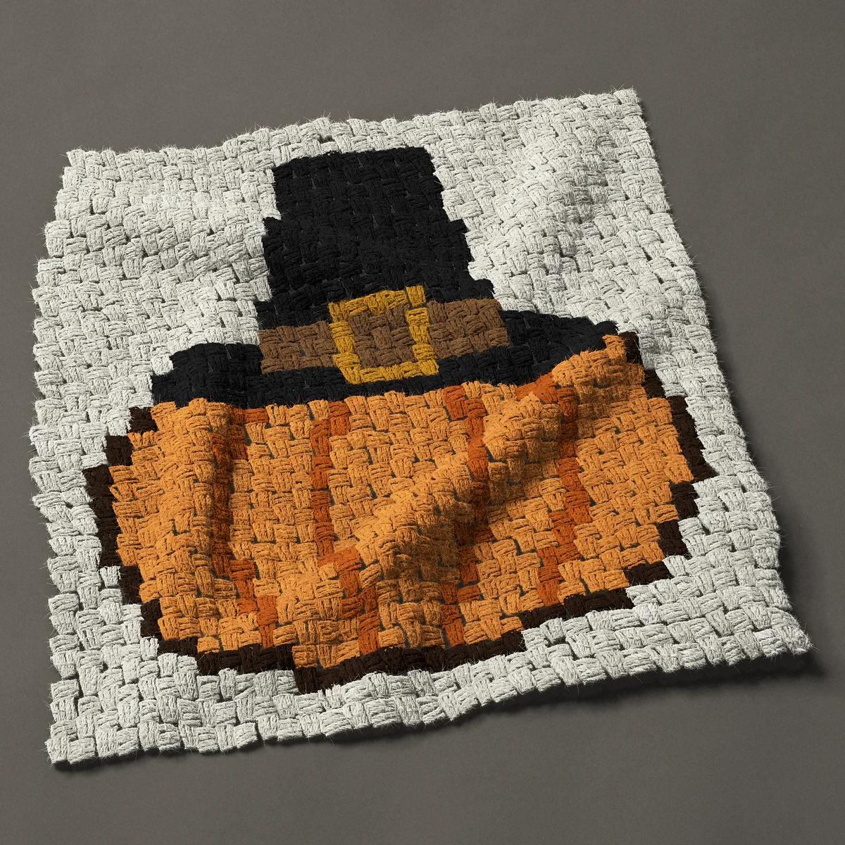 A panel worked corner to corner, 26¼ by 27¾ inches: Thanksgiving pumpkin wearing a pilgrim hat, 35 by 37 blocks