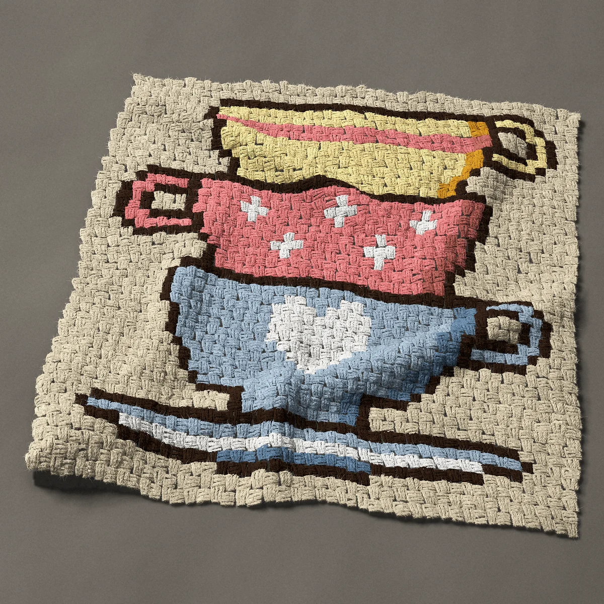 A panel worked corner to corner, 33¾ by 34½ inches: Three stacked teacups with stripe, dots and a heart, 45 by 46 blocks