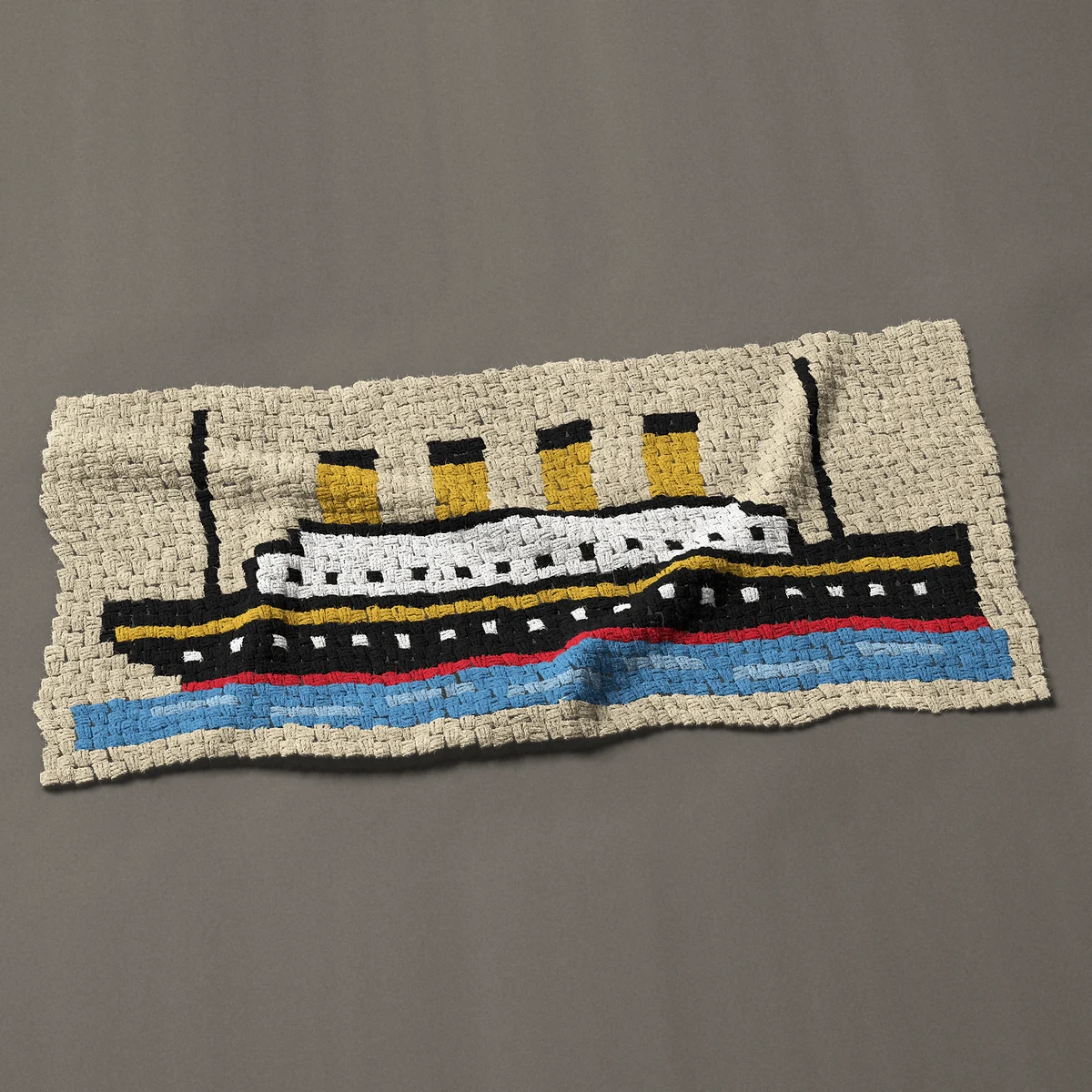 A panel worked corner to corner, 51 by 24 inches: Titanic: four-funnel ocean liner of 1912, side view, 68 by 32 blocks