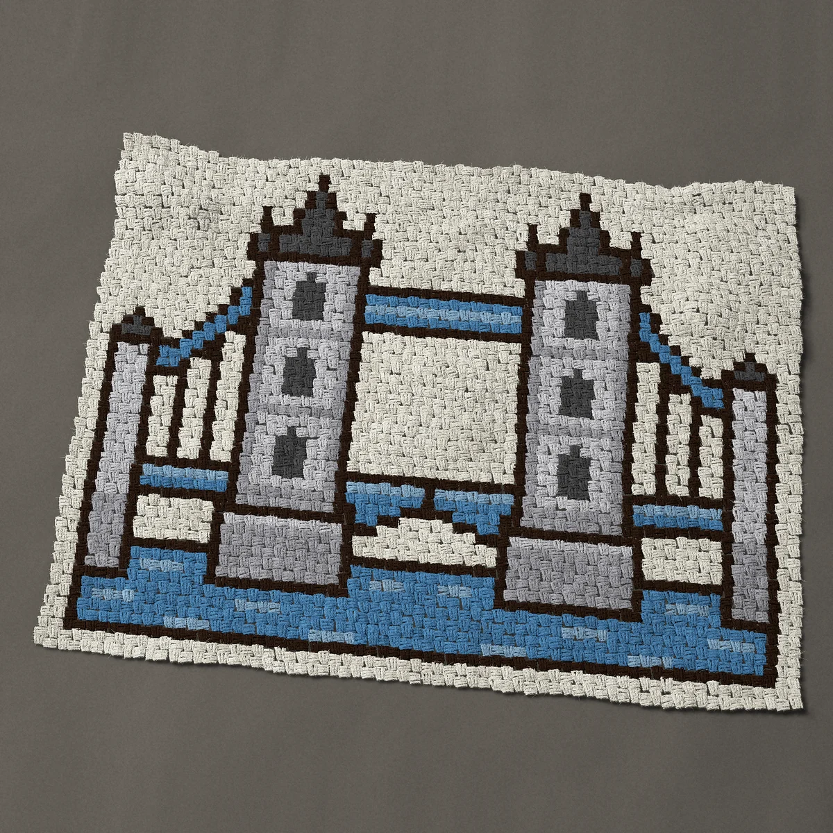 A baby blanket worked corner to corner, 50 by 39 inches: Tower Bridge in London over the River Thames, 67 by 52 blocks