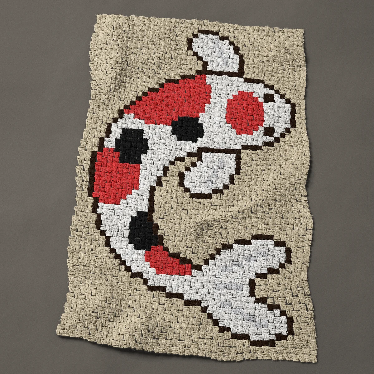 A baby blanket worked corner to corner, 30¾ by 48 inches: Koi fish seen from above with red and black patches, 41 by 64 blocks
