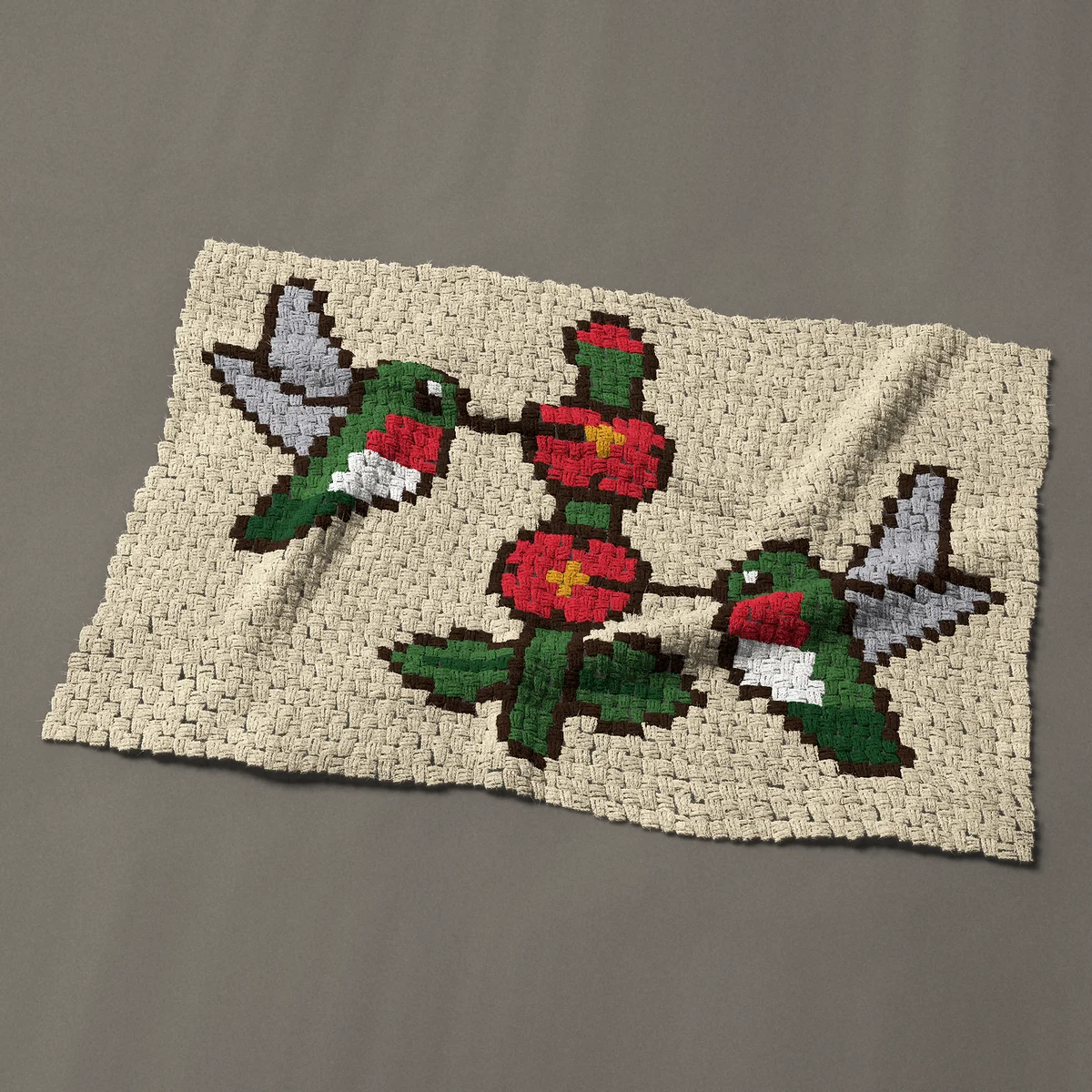 A baby blanket worked corner to corner, 47 by 32¼ inches: Two ruby-throated hummingbirds at red flowers, 63 by 43 blocks