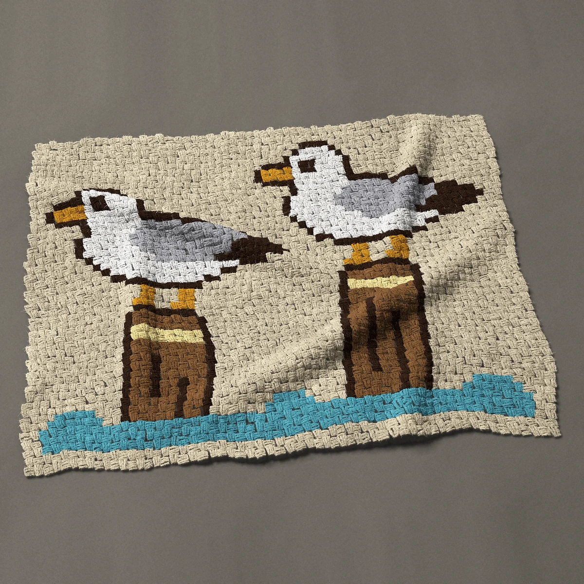 A baby blanket worked corner to corner, 45 by 36 inches: Two seagulls on wooden posts in the sea, 60 by 48 blocks