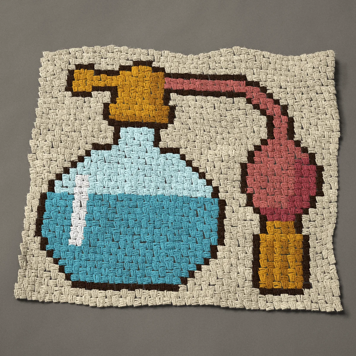 A panel worked corner to corner, 33¾ by 30¾ inches: Vintage perfume atomizer bottle with a bulb and tassel, 45 by 41 blocks