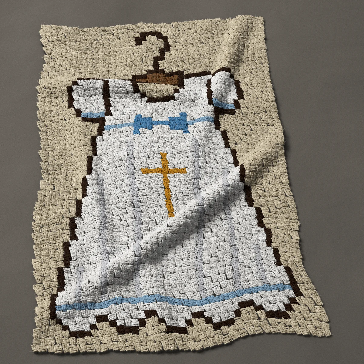 A baby blanket worked corner to corner, 30¾ by 48½ inches: Baptism or christening gown on a hanger with a blue bow, 41 by 65 blocks