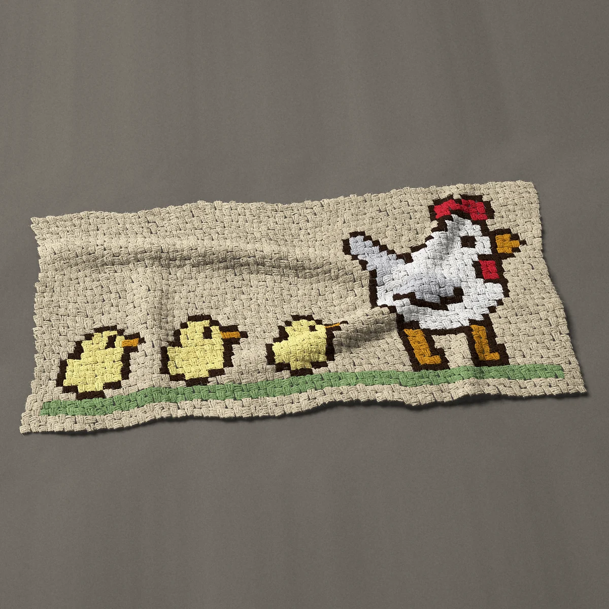 A baby blanket worked corner to corner, 51 by 25½ inches: White hen and chicks in a row on the grass, 68 by 34 blocks