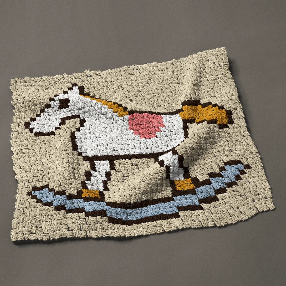 A panel worked corner to corner, 33¾ by 28½ inches: White rocking horse with a pink saddle, 45 by 38 blocks