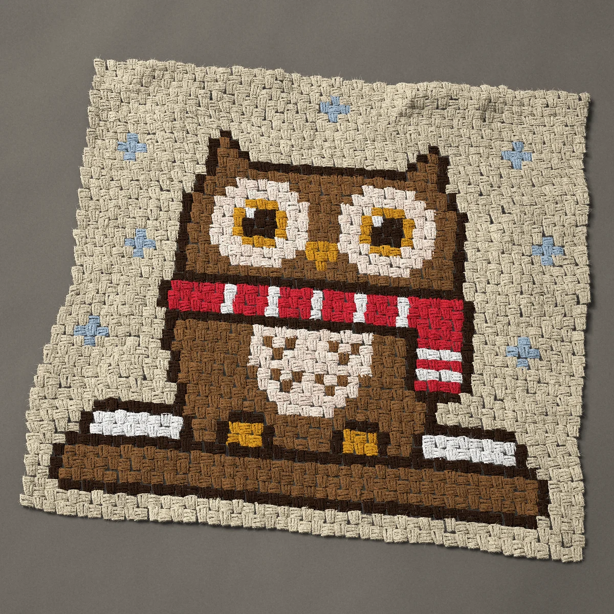 A panel worked corner to corner, 36 by 33¾ inches: Winter owl in a red scarf on a snowy branch, 48 by 45 blocks