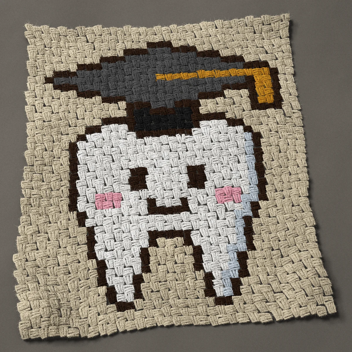 A panel worked corner to corner, 24¾ by 29¼ inches: Wisdom tooth in a graduation cap, a cute smiling tooth, 33 by 39 blocks