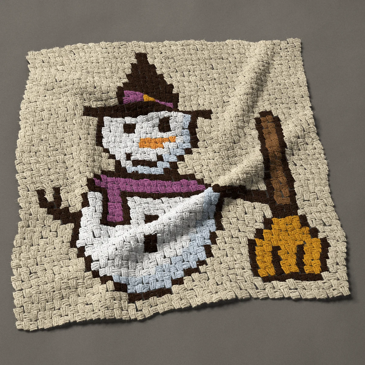 A panel worked corner to corner, 33 by 36 inches: Witch hat snowman holding a broom, 44 by 48 blocks