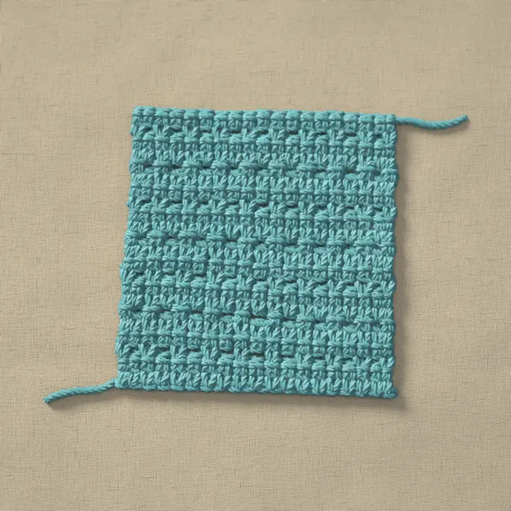 A swatch of single crochet eyelet rows.