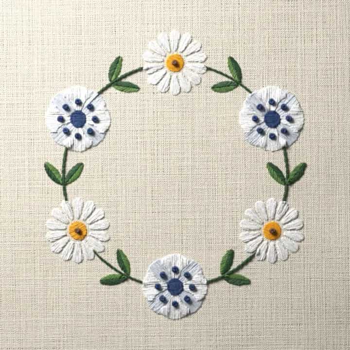 Anemone and daisy wreath: preview of the stitched design
