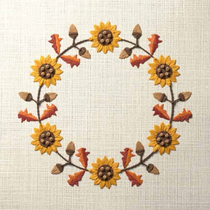 Autumn wreath of sunflowers and acorns: preview of the stitched design