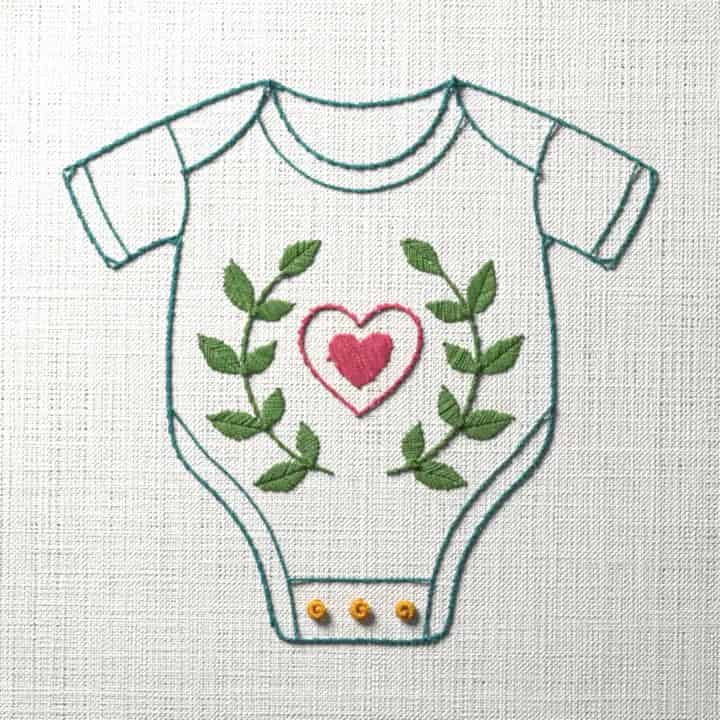 Baby onesie with a heart: preview of the stitched design