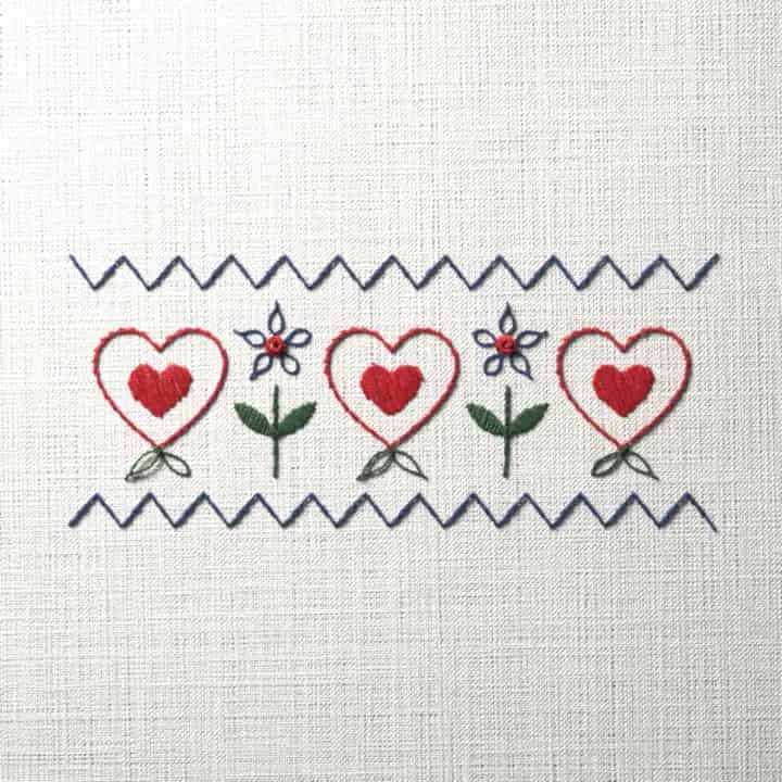 Hearts and flowers folk trim: preview of the stitched design