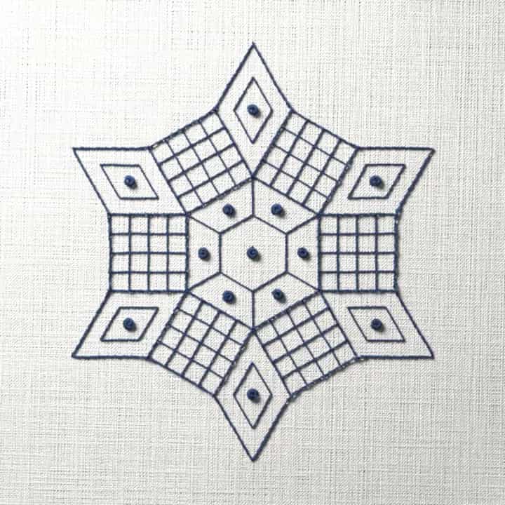 Blackwork lozenge rosette: preview of the stitched design