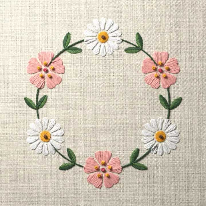 Blossom and daisy wreath: preview of the stitched design