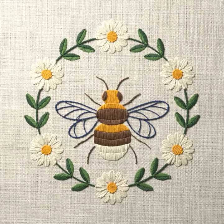Bumblebee in a daisy ring: preview of the stitched design