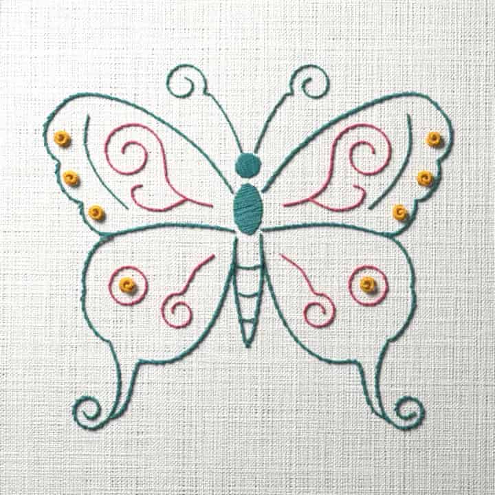 Butterfly with cloud scrolls: preview of the stitched design