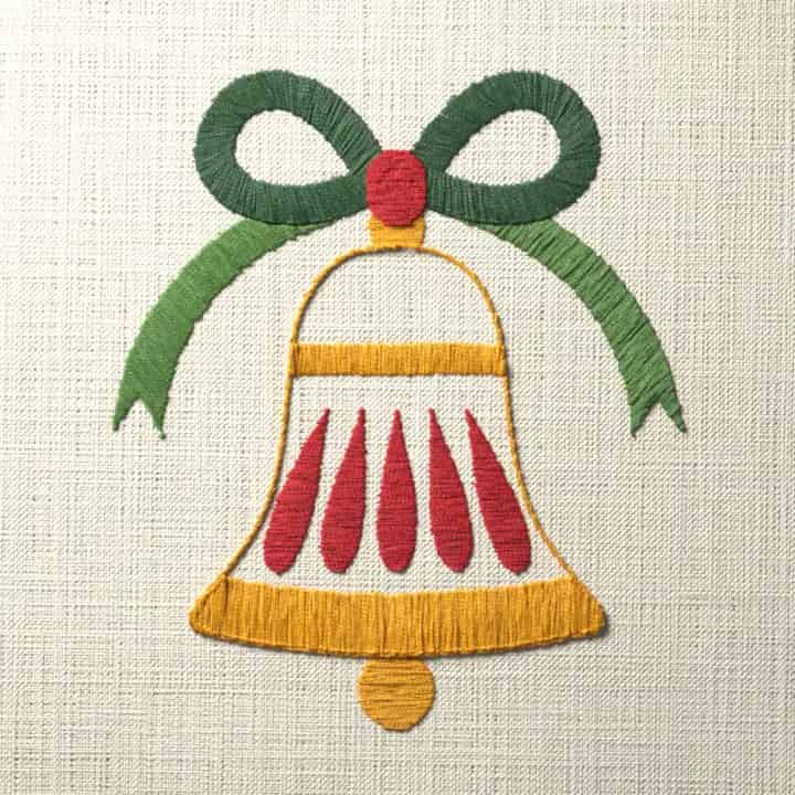 Christmas bell with a green bow: preview of the stitched design