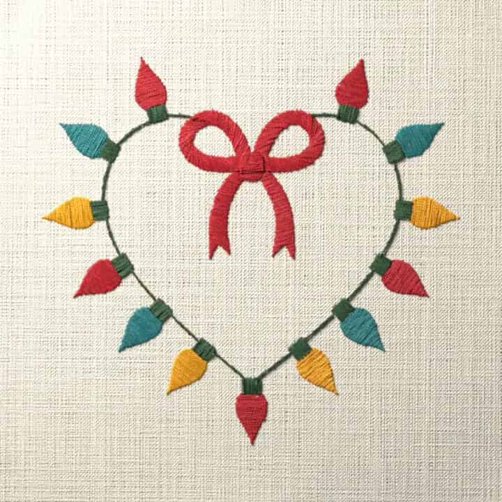 Christmas lights heart with a bow: preview of the stitched design